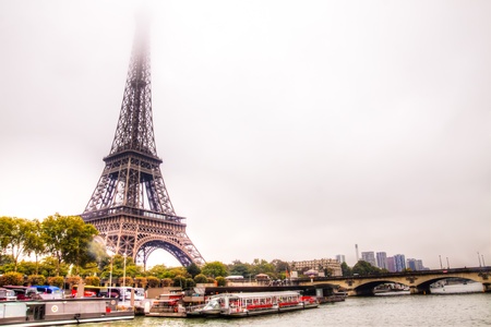 The Eiffel Tower ,La Tour Eiffel is an iron lattice tower located on the Champ de Mars in Paris,...