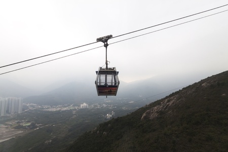 HONG KONG - JANUARY 6 :Ngong Ping 360 on January 6,2013. Consisting of a cable car journey and a themed village, it is one of the must see attractions in Hong Kong travel. Close to the Hong Kong International Airport and only a few minutes' walk from Tuのeditorial素材