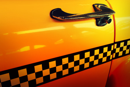 Door of taxi with checker, Close Up of Checker of Vintage Taxi Carの写真素材