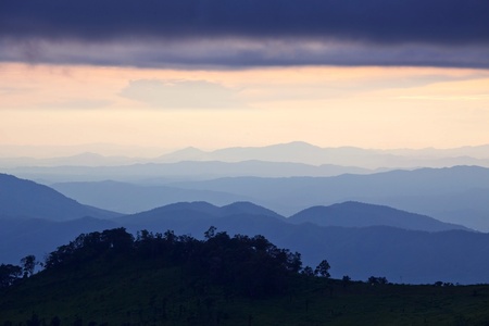 Blue sunset in the mountainsの写真素材