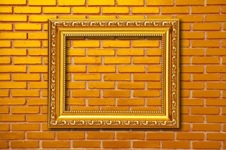 wood frame on brickwallの写真素材