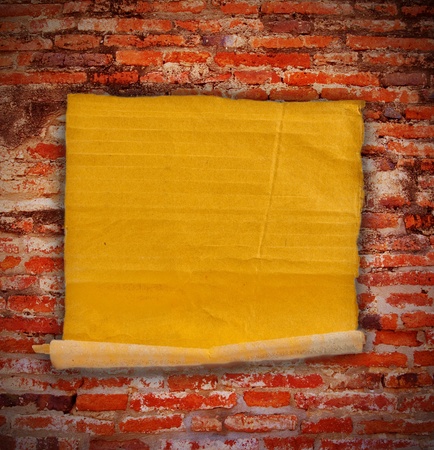 notepaper on brickwallの写真素材