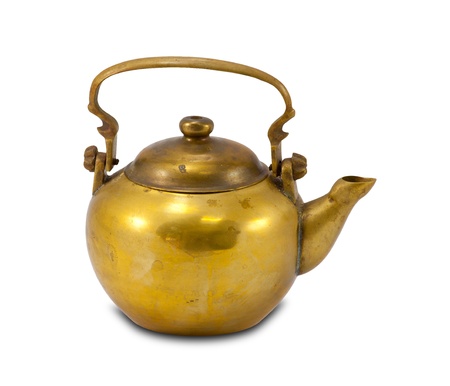 Old gold teapot isolated on the white backgroundの写真素材