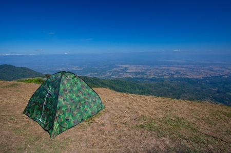Tourist tent in mountain landscape in Thailandの写真素材