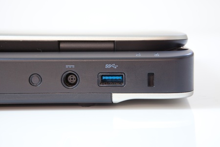 modern hi-end laptop computer with USB and sound on white background