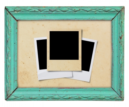 Blank photos frames on woodの写真素材