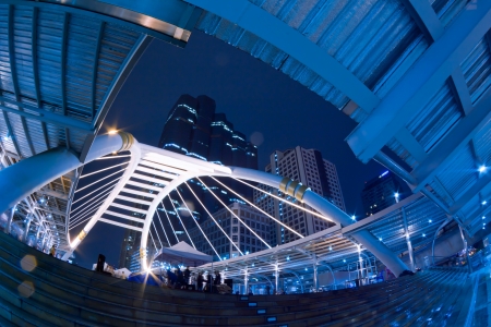 Crowd Walking at Skywalk and Night traffic lights in the Bangkok, Thailandの写真素材