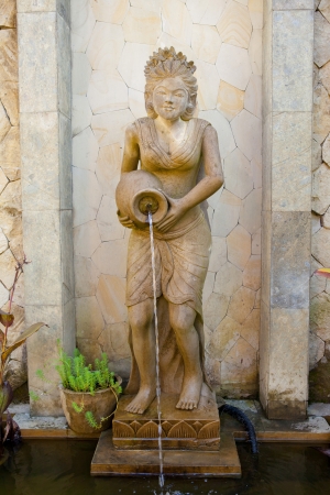 Water is released from the statues in Bali, Indonesiaの写真素材