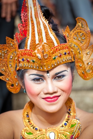 BALI, INDONESIA - MARCH 16: Girl during a classic national Balinese dance Barong on March 16, 2013 on Bali, Indonesia. Barong is very popular cultural show on Bali.のeditorial素材
