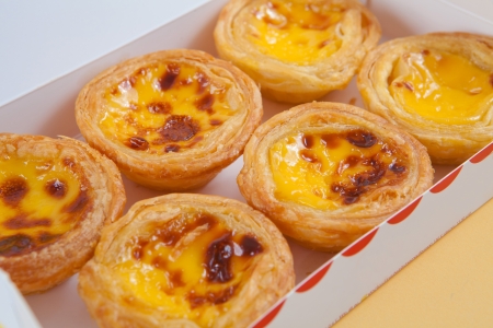 delicious portuguese egg tart on white box