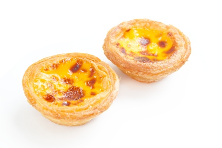 delicious portuguese egg tart isolated on white backgroundの写真素材