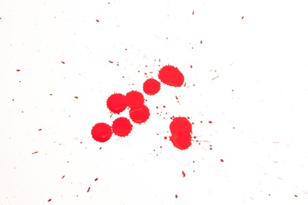 close up of red drops on white backgroundの写真素材