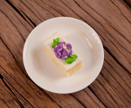 Flower Cake in white dish on the wood table