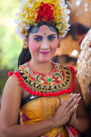 BALI, INDONESIA - MARCH 16: Girl during a classic national Balinese dance Barong on March 16, 2013 on Bali, Indonesia. Barong is very popular cultural show on Bali.のeditorial素材