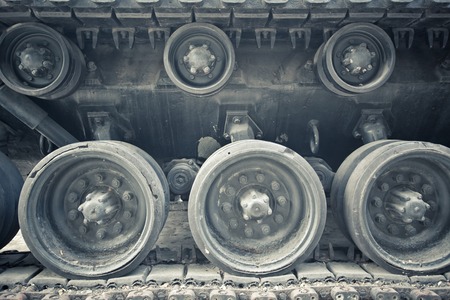close up of track and wheels of tankの写真素材