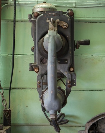 old-fashioned classic vintage telephone on the  wall