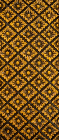 Pattern of flower carved on wood backgroundの写真素材