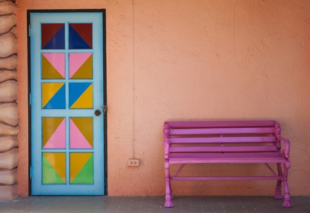 old vintage wooden chair and doorの写真素材