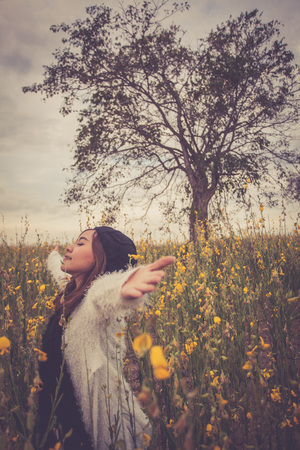 Beautiful asian woman in fields crotalaria,Thailandの写真素材