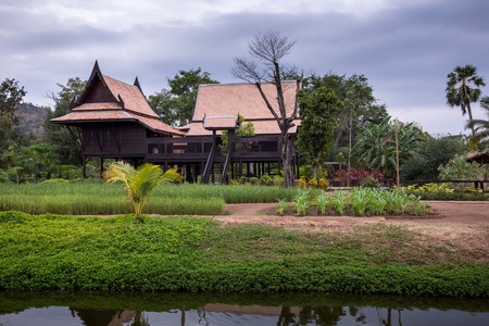 Thai traditional houses style near river in Thailandの写真素材