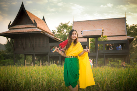 Thai woman dressing with  umbrella traditional styleの写真素材