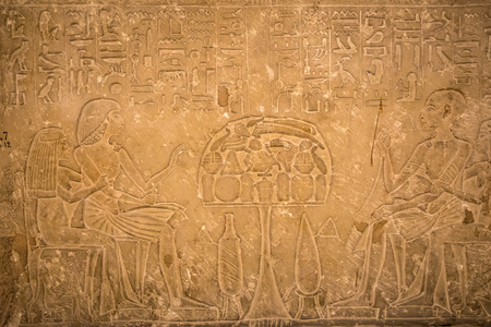 Hieroglyphic drawings and paintings on the walls of the ancient Egyptian temple