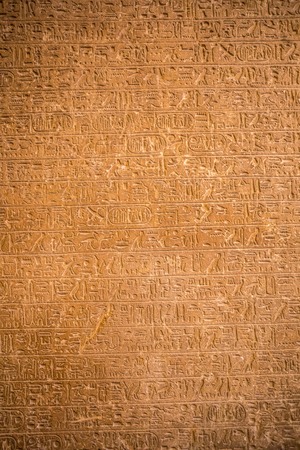 Hieroglyphic drawings and paintings on the walls of the ancient Egyptian temple