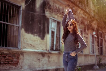 Portrait of young pretty hipster asian woman