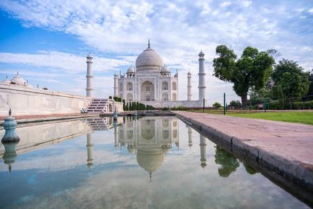 The morning view of Taj Mahal monument reflecting in water of the pool, Agra, Indiaのeditorial素材