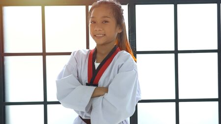 Portrait asian girl taekwondo in studioの写真素材