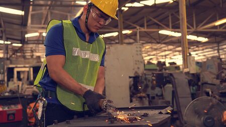 Service man engineer working at manufacturing factory
