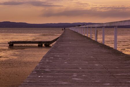 A large tidal lake at sunset.の写真素材