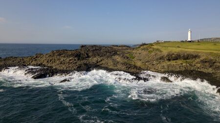 A view from Kiama Blow Hole Point on the south coast of New South Wales, Australia. In aboriginal the word Kiama means âwhere the ocean makes noiseâ.の写真素材