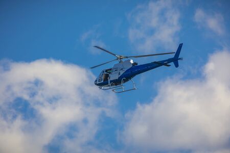 Helicopter operation in an organised Fire Service back burning to prevent bush fires in the mountains.の写真素材