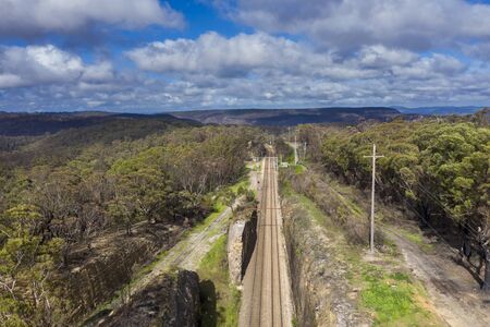 A regional railway line running through The Blue Mountains in Australiaの写真素材