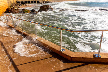 Photograph of the Rock Pool in the Pacific Ocean at Terrigal Beach at sunset on the Central Coast in New South Wales in Australiaの写真素材