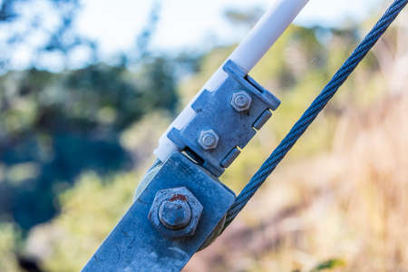 Photograph of a tensioner bracket on a transmission lineの写真素材