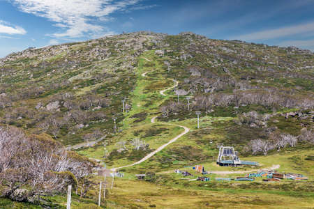 Photograph of a ski run in summer in Perisher Valley in the Snowy Mountains in New South Wales in Australiaの写真素材