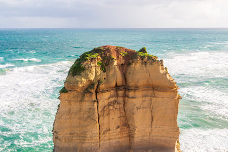 Photograph of the historic and famous 12 Apostles limestone rock stacks along the rugged Great Ocean...