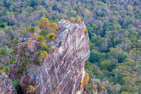 Photograph of the rugged and rocky cliff face of mountains the Megalong Valley in the Blue Mountains in New South Wales in Australiaの写真素材