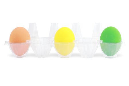 Colorful eggs put on tray with white background and clipping path, on Easter eggs themeの写真素材