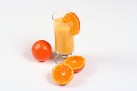 oranges with orange juiceの写真素材