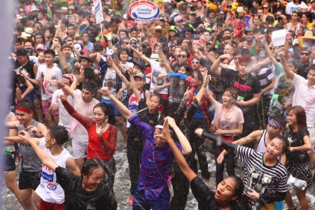 CHIANGMAI THAILAND-APRIL 13:Chiang Mai Songkran festival. Water gun are popular for play water fighting in the tourism festival.on April 13,2013 in Chiang Mai,Thailand. のeditorial素材