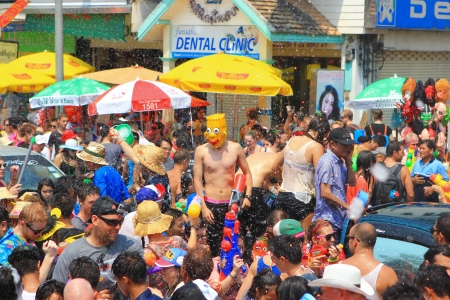 CHIANGMAI THAILAND-APRIL 13:Chiang Mai Songkran festival. Water gun are popular for play water fighting in the tourism festival.on April 13,2013 in Chiang Mai,Thailand. のeditorial素材