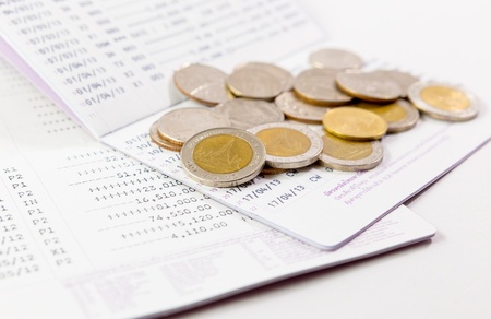 Thai money with bank statementの写真素材