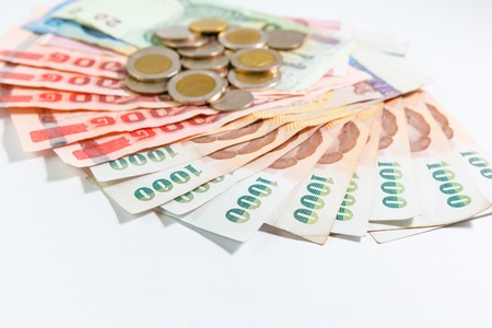 Thai money with bank statementの写真素材