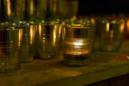 colorful candles in the glassの写真素材