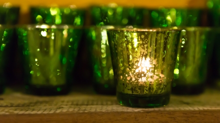 colorful candles in the glassの写真素材