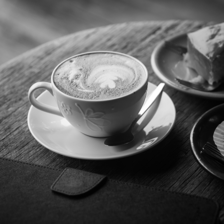 hot coffee on grunge wood backgroundの写真素材