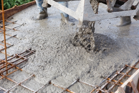 Cement pouring for house construction の写真素材